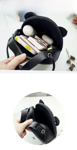 Internal view showing the spacious capacity of this cat-eared PU leather crossbody bag