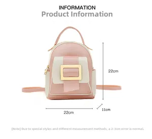 Detailed view of pink and beige mini backpack showing dimensions 22x22x11cm and gold lock