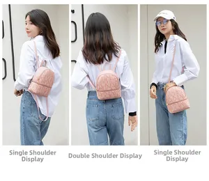 Mochila pequeña rosa para mujer con estampado de letras LUCKY y cremalleras doradas