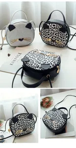 Detail of glitter cat face crossbody bag with 3D ears and metallic whiskers hardware