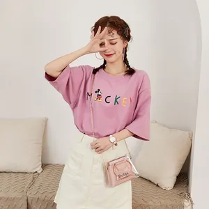 Pink Mickey Mouse t-shirt with transparent PVC handbag and white denim skirt set