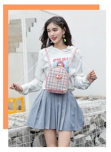 Mini pink plaid backpack featuring cute cat ears and elegant pearl charm detail