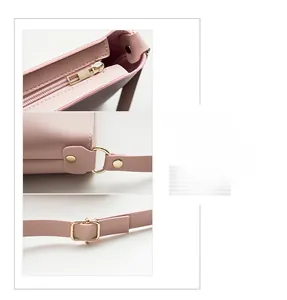Detail view of pink crossbody bag showing zipper, metal plating and neat sewing thread