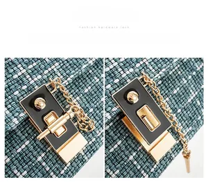 Close-up of golden metal clasp on color-block tweed bag showing open and closed states