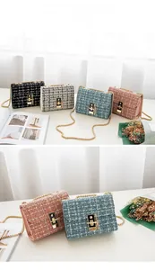 Close-up of tweed chain shoulder bags featuring four colors and gold metal twist locks