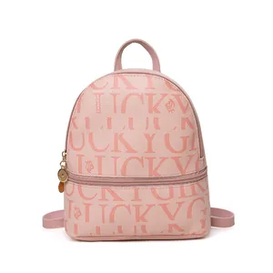 Mini mochila rosa para mujer con estampado Lucky Girl y colgante dorado en blanco