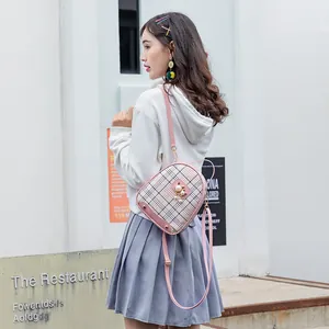 Pink plaid backpack for women featuring cute cat ear metal trim and pearl charm