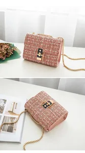 Detail of pink tweed chain bag with dual-view perspective and golden metal clasp