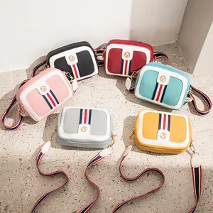 Chic camera bags in multiple colors with striped ribbon and gold V logo