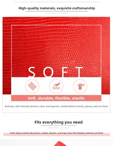 Detail of red faux snakeskin leather texture showing soft, durable and waterproof material