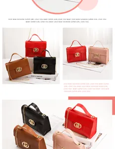 Detail of snake embossed small square bags in four colors with gold circular locks