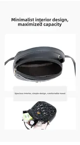 Detail view of black quilted leather mini bag showing spacious interior and daily essentials