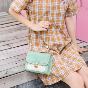 Chic mint green and cream white contrast chain shoulder bag for women summer style