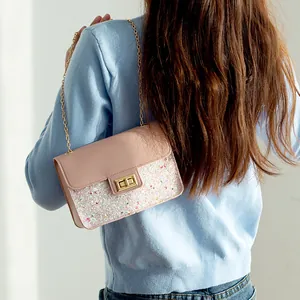 Pink leather chain crossbody bag with shimmering glitter sequins and gold metal lock