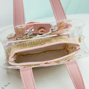 Sac seau transparent à imprimé marguerites avec poignées roses et pochette intérieure