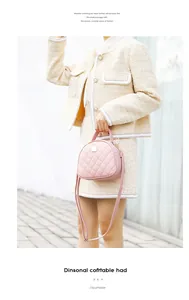 Piccola borsa a mano rosa trapuntata a semicerchio con tracolla e dettagli in metallo oro