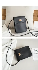 Detail of black crossbody bag featuring scalloped edges and gold square twist lock