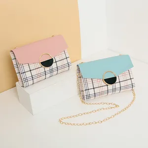 Women's plaid crossbody bag with metal ring buckle and chain strap in pink and blue