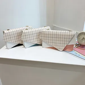 Minimalist plaid flap shoulder bag with gold chain strap in black, blue and pink colors