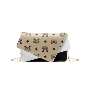 Three-color patchwork crossbody chain bag with fashion logo print and gold hardware
