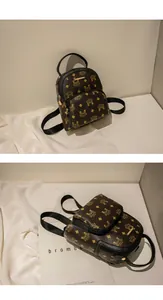 Detailed top and side view of dark brown mini backpack with diamond pattern and zipper