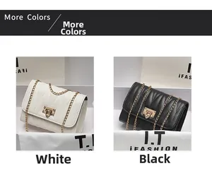 Close-up of quilted crossbody bags in white and black with elegant gold chain straps
