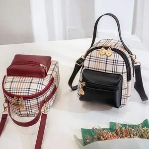Mini plaid backpack with red and black leather trim and gold hardware for women