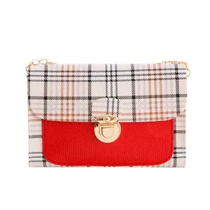 Women's plaid patchwork crossbody bag with red faux leather and golden chain strap