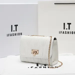 White quilted chain shoulder bag with gold hardware, box, dust bag and gift bag