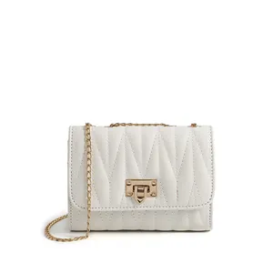 White quilted crossbody chain bag for women with gold hardware and flap closure