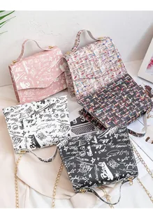 Variety of mini chain bags featuring graffiti prints and elegant tweed textures