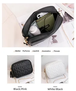 Quilted small square crossbody bag with tassel and metal chain strap interior view