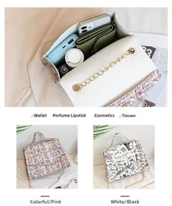 Internal view of patterned chain crossbody bag showing capacity for phone and cosmetics