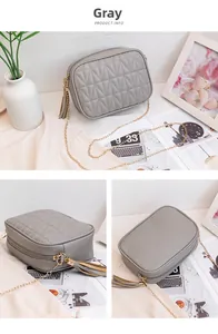 Detailed views of a grey quilted crossbody bag with gold chain and fringe tassel