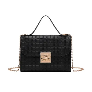 Classic black quilted crossbody square bag with gold metal lock and chain strap