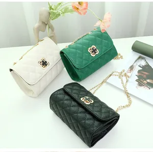 Detailed display of quilted chain crossbody bags in white, green, and black with clover lock