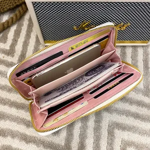 Portefeuille long blanc à broderie cœur, intérieur rose, fentes cartes et poche téléphone