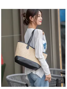Grand sac cabas tissé avec garniture en similicuir noir et bandoulière longue en extérieur