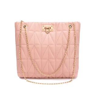Pink quilted faux leather bucket bag with golden chain straps and turn-lock closure
