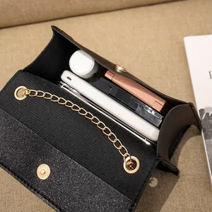 Borsa a tracolla glitterata nera con scomparto interno per telefono e cosmetici