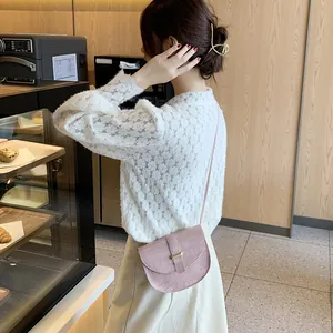 Pink crocodile pattern mini saddle crossbody bag with gold hardware for women