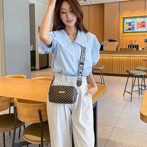 Sac bandoulière marron à monogramme pour femme avec large sangle et logo doré