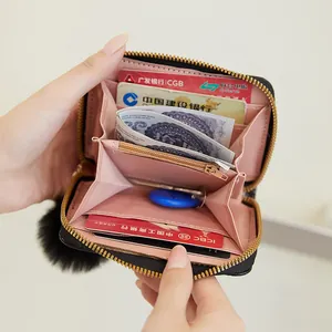 Woven texture card holder with pompom charm featuring multi-slot accordion interior