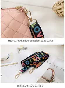 Detail of pink quilted bag with high-quality gold hardware and detachable LOVE strap