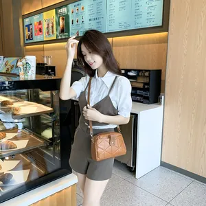 Brown quilted crossbody bag for women in high-quality synthetic leather with metal clasp