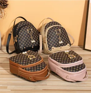 Group shot of four colorful mini backpacks featuring retro patterns and pearl tassels