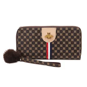 Brown long zipper wallet with vintage clover pattern, gold bee charm and striped ribbon