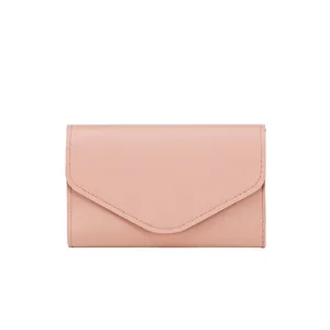 Pink minimalist envelope style passport wallet with high-quality faux leather texture