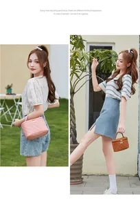 Sac cosmétique matelassé avec poignée et boucle dorée, coloris rose et marron élégant