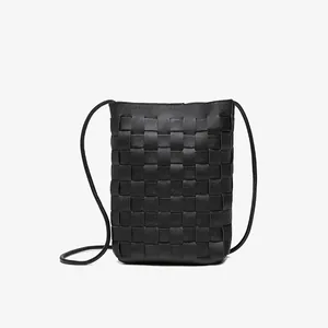 Vertical black woven phone crossbody bag featuring a classic Intrecciato texture on white background